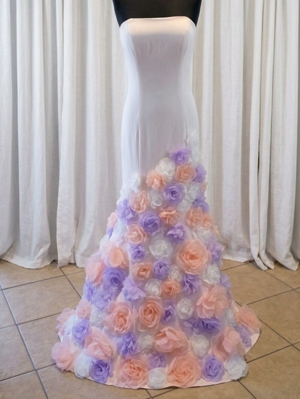 Terani Couture Strapless Mermaid Gown With Skirt Covered In Pastel Flowers.